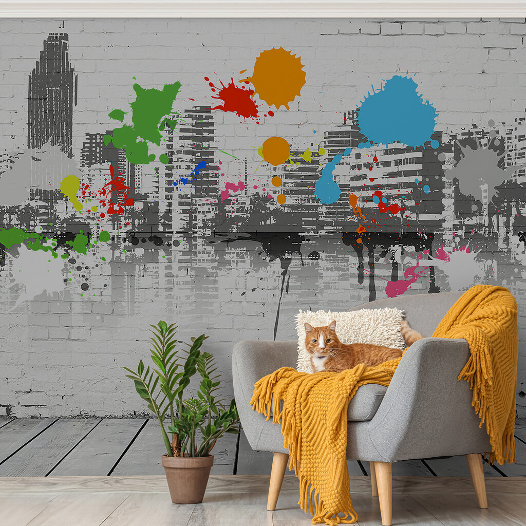 White brick wall with colorful paint splatters