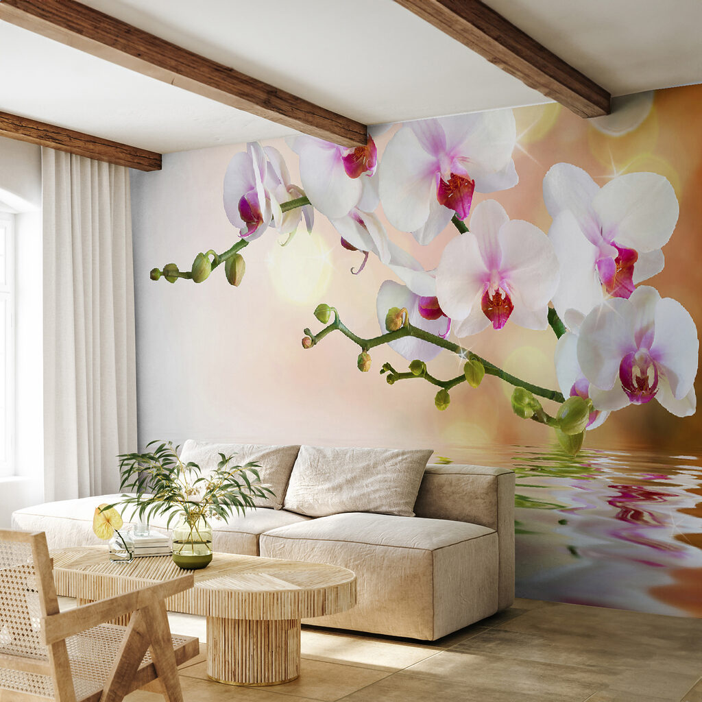 White orchids on a branch with water ripples