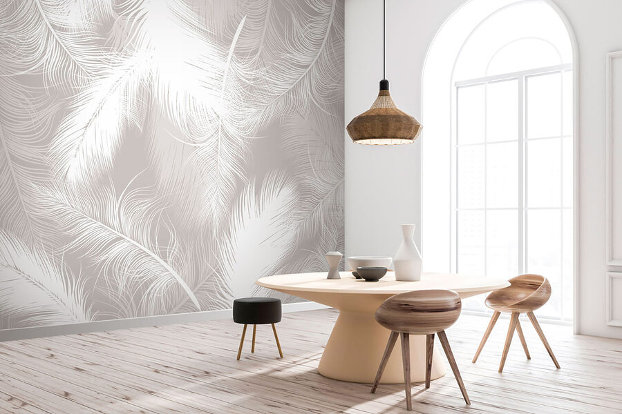 White feathers on a gray background