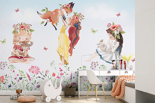 Group of girls holding animals in a field of flowers Group of girls holding animals in a field of flowers