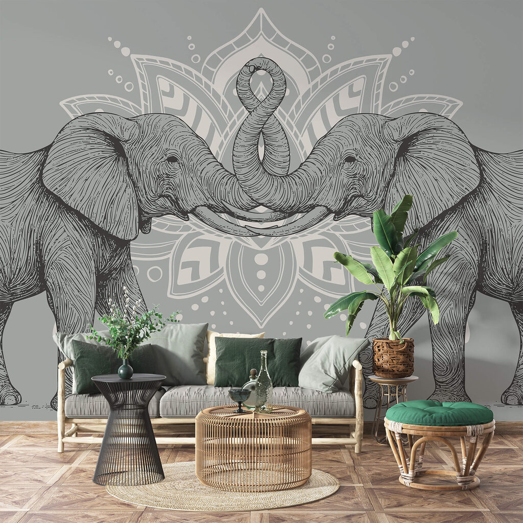 Two elephants with their trunks touching each other