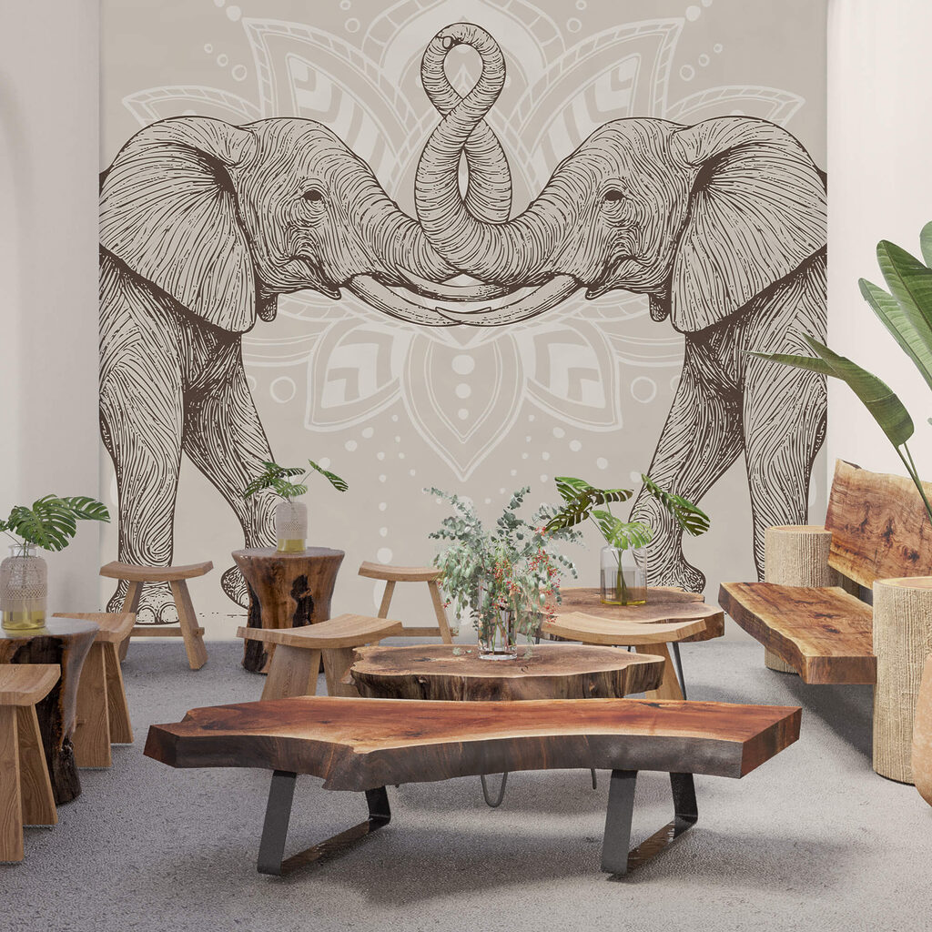 Two elephants with their trunks curled up