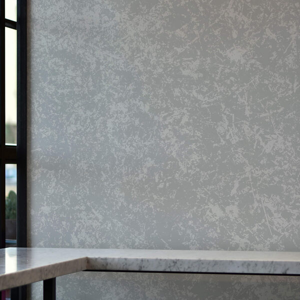 White speckled surface with small dots White speckled surface with small dots