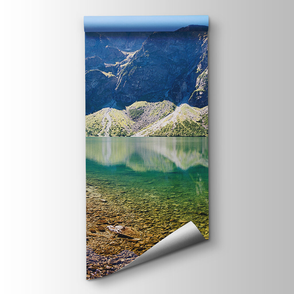 Lake with mountains in the background Lake with mountains in the background