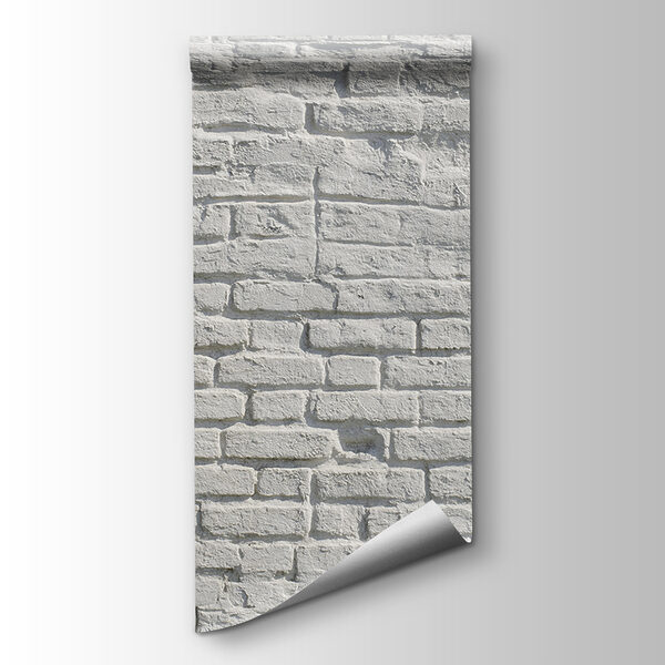 White brick wall with black spots White brick wall with black spots