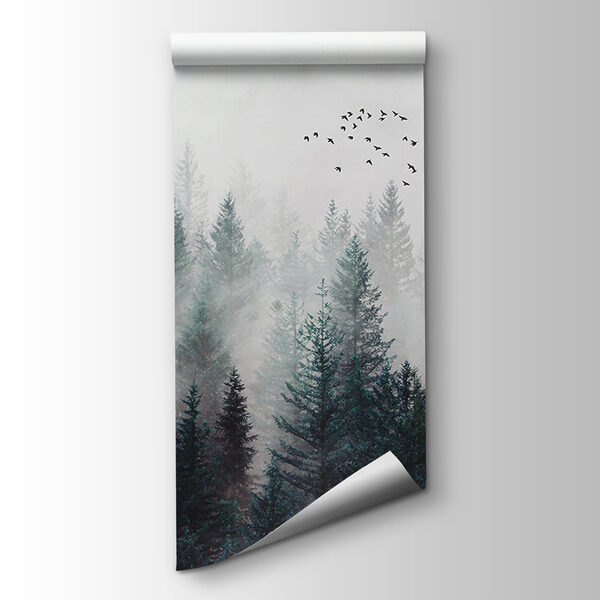 Group of birds flying over a forest