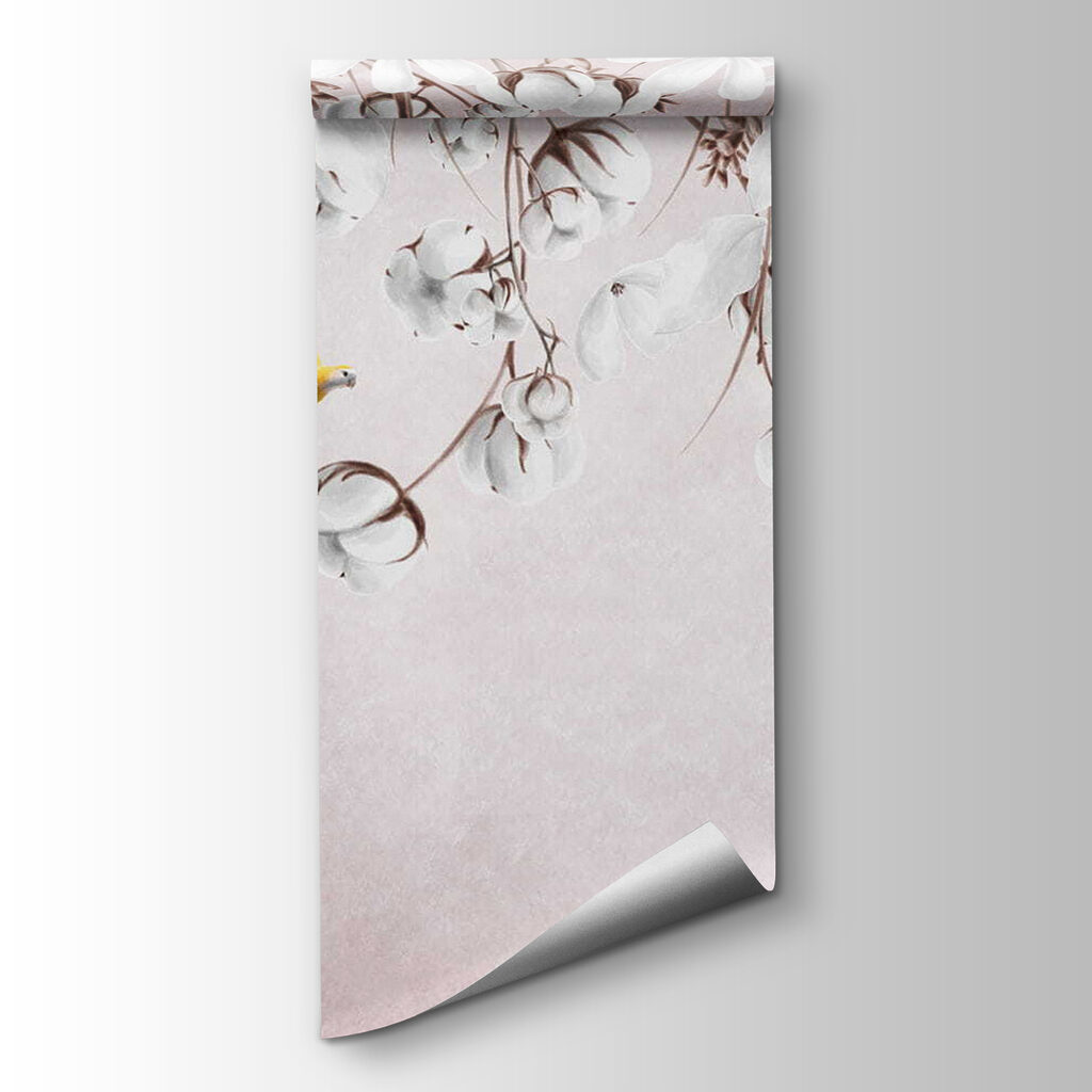 Bird flying over cotton flowers