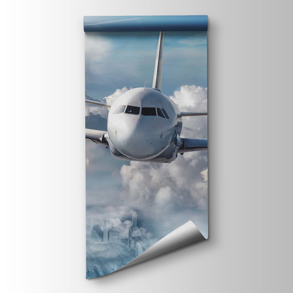 An airplane flying in the sky An airplane flying in the sky