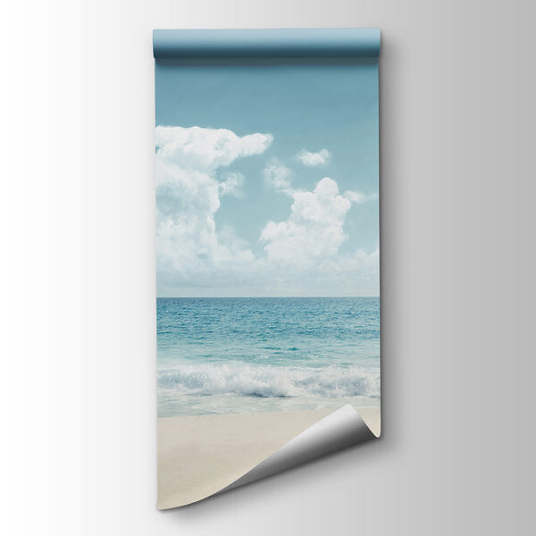 A beach with waves crashing on the sand A beach with waves crashing on the sand