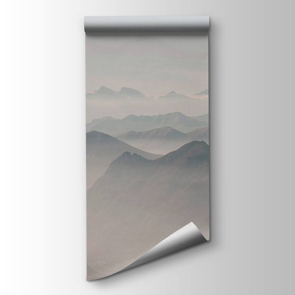 A mountain range with fog