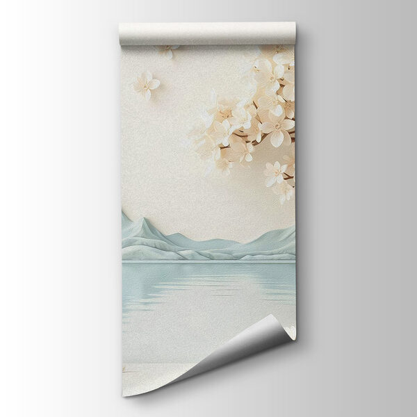 Tree with flowers and rocks next to water