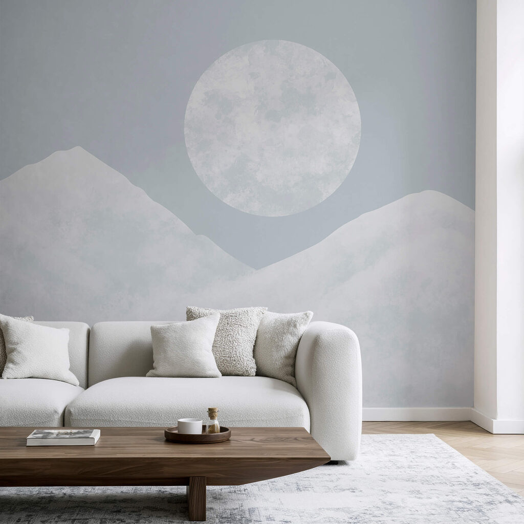 Moon over a snowy mountain