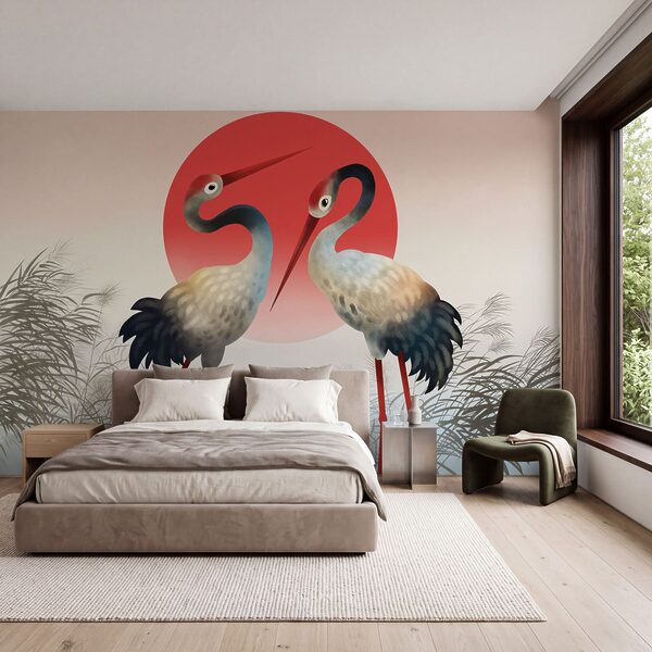 Two birds standing in front of a red sun Two birds standing in front of a red sun